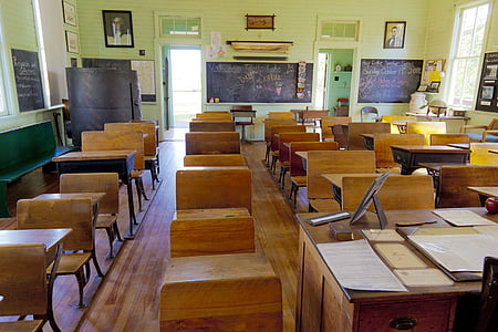 brown wooden writing desk inside room thumbnail