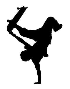 Silhouette of skateboarder doing one-armed handstand trick. thumbnail