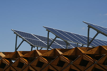 three solar panels on wood thumbnail