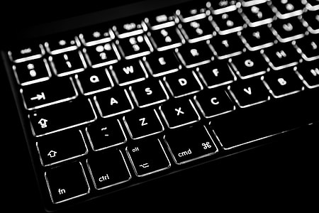 Close-up shot of the backlit keyboard from a laptop computer thumbnail