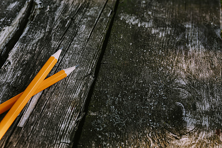 Small flowers, pencils and other things on wood thumbnail