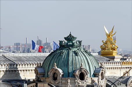 white and gray concrete dome building under blue sky thumbnail