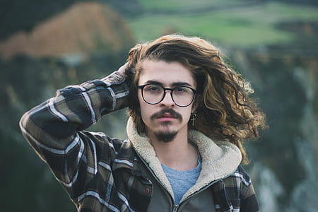 man holding his hair thumbnail