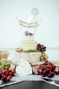 3-tier white icing covered cake thumbnail