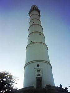 low-angle photography of white concrete lighthouse during daytime thumbnail