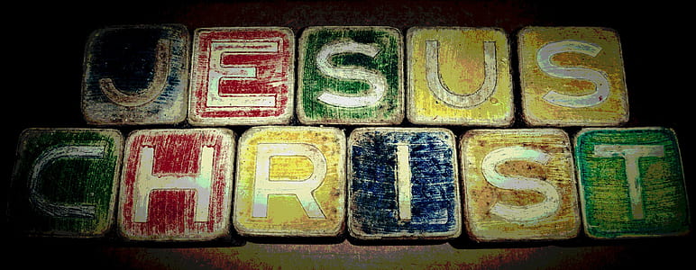 assorted-color wooden cubes with Jesus Christ letters thumbnail