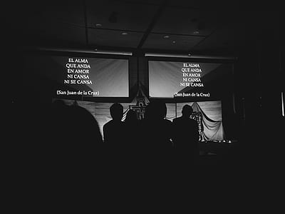 silhouette of group of people under projector canvas thumbnail