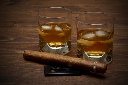 brown tobacco beside clear drinking glasses thumbnail