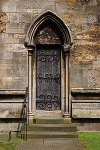 closed grey and black wooden door with steel decor thumbnail