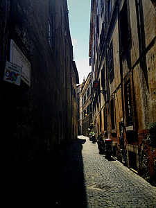 grey top road between concrete building on daytime thumbnail