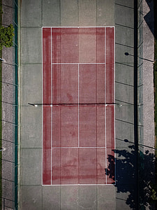 aerial view of red and grey concrete court thumbnail