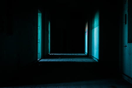 empty dark room with opened door thumbnail