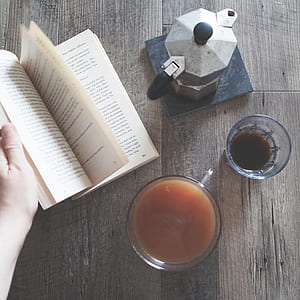 silver moka pot beside drinking glass thumbnail