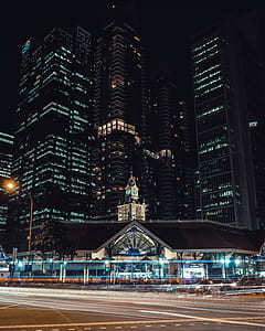 lighted high-rise building during nighttime thumbnail