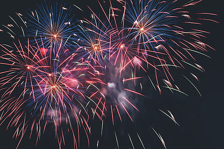 Fireworks display in the night sky thumbnail