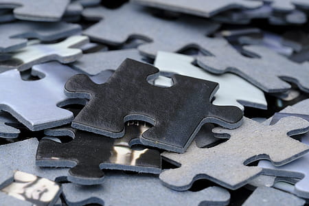 close-up photo of black jigsaw puzzle thumbnail