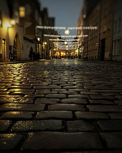 gray brick road during nighttime thumbnail