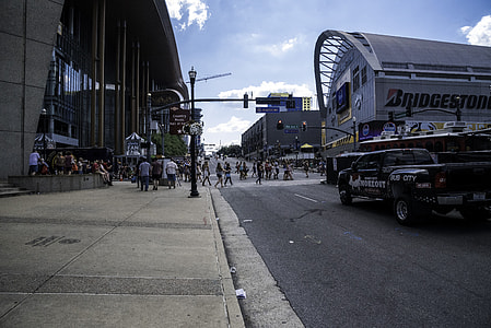 Cars, people, and buildings at the Country Music Awards Festival thumbnail