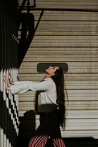 woman standing near white grills thumbnail