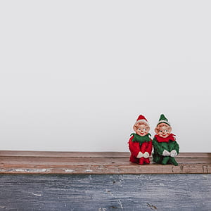 two dwarfs on brown surface thumbnail