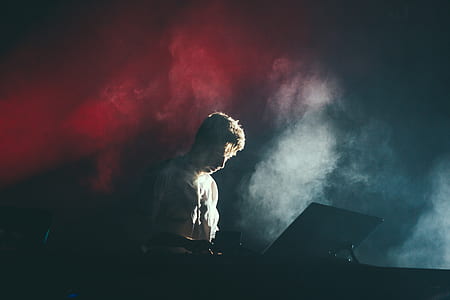man standing on stage thumbnail