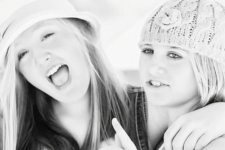 grayscale photo of two women thumbnail