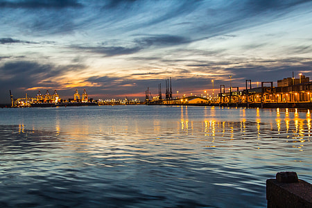 city buildings near body of water thumbnail