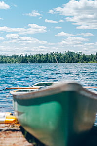 closeup photo of green clinker boat thumbnail
