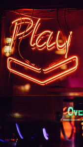 red play neon light signage turned on thumbnail