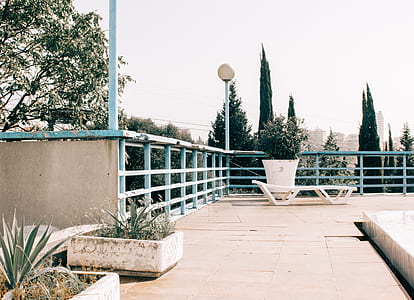 White Sun Lounger Near Light Post thumbnail