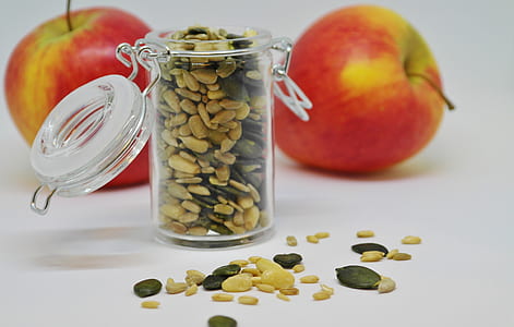 clear glass jar and two apples thumbnail