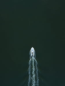 motorboat on body of water thumbnail
