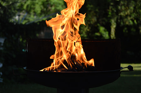 fire on gas grill during daytime thumbnail