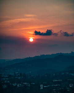 aerial photography of buildings during sunset thumbnail