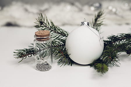 white bauble beside clear glass condiment shaker thumbnail