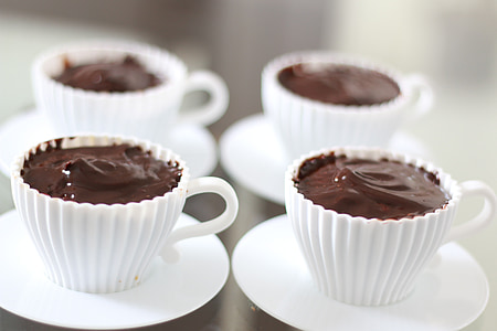 chocolate drink in four white cups thumbnail
