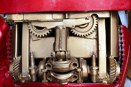 Mechanical cogs and gears that look like a robot face thumbnail