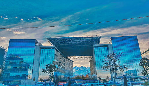 blue glass high rise building thumbnail