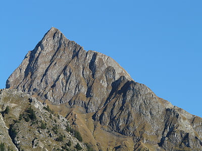 rock mountain under blue sky thumbnail