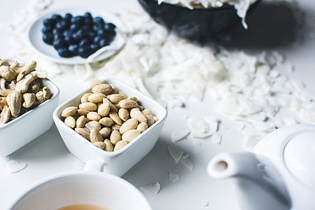 Peeled almonds with coconut and blueberries thumbnail