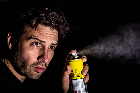 man holding spray bottle while sprays thumbnail