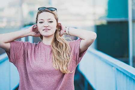 woman holding her back head thumbnail