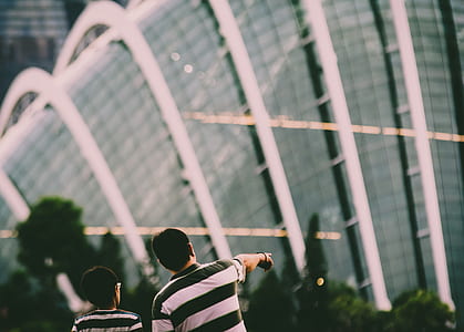 shallow focus photography of man pointing thumbnail