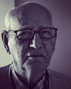 grayscale photo of man wearing eyeglasses thumbnail