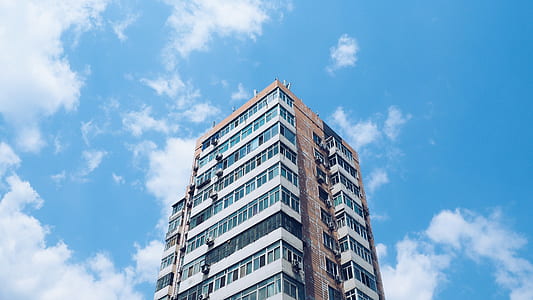 worm's-eye view photography of city building thumbnail