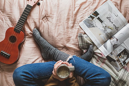 Cozy Reading In Bed Photo thumbnail