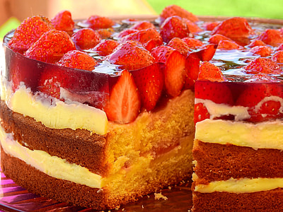brown and white cake with strawberry toppings thumbnail