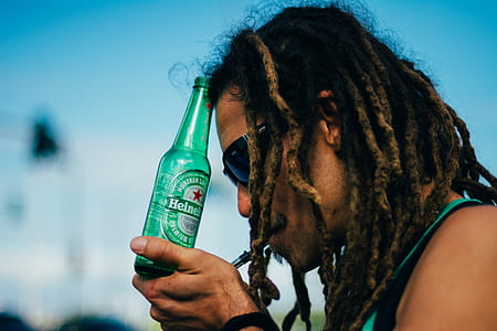 man holding bottle thumbnail