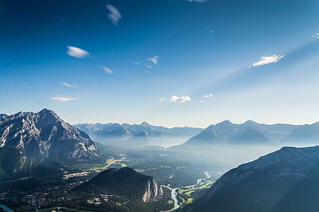 mountains under cloudy sky thumbnail