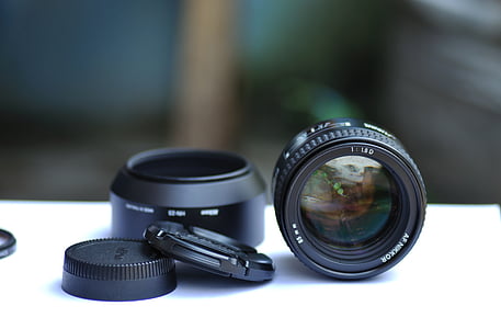 camera lens and cover on tbale thumbnail